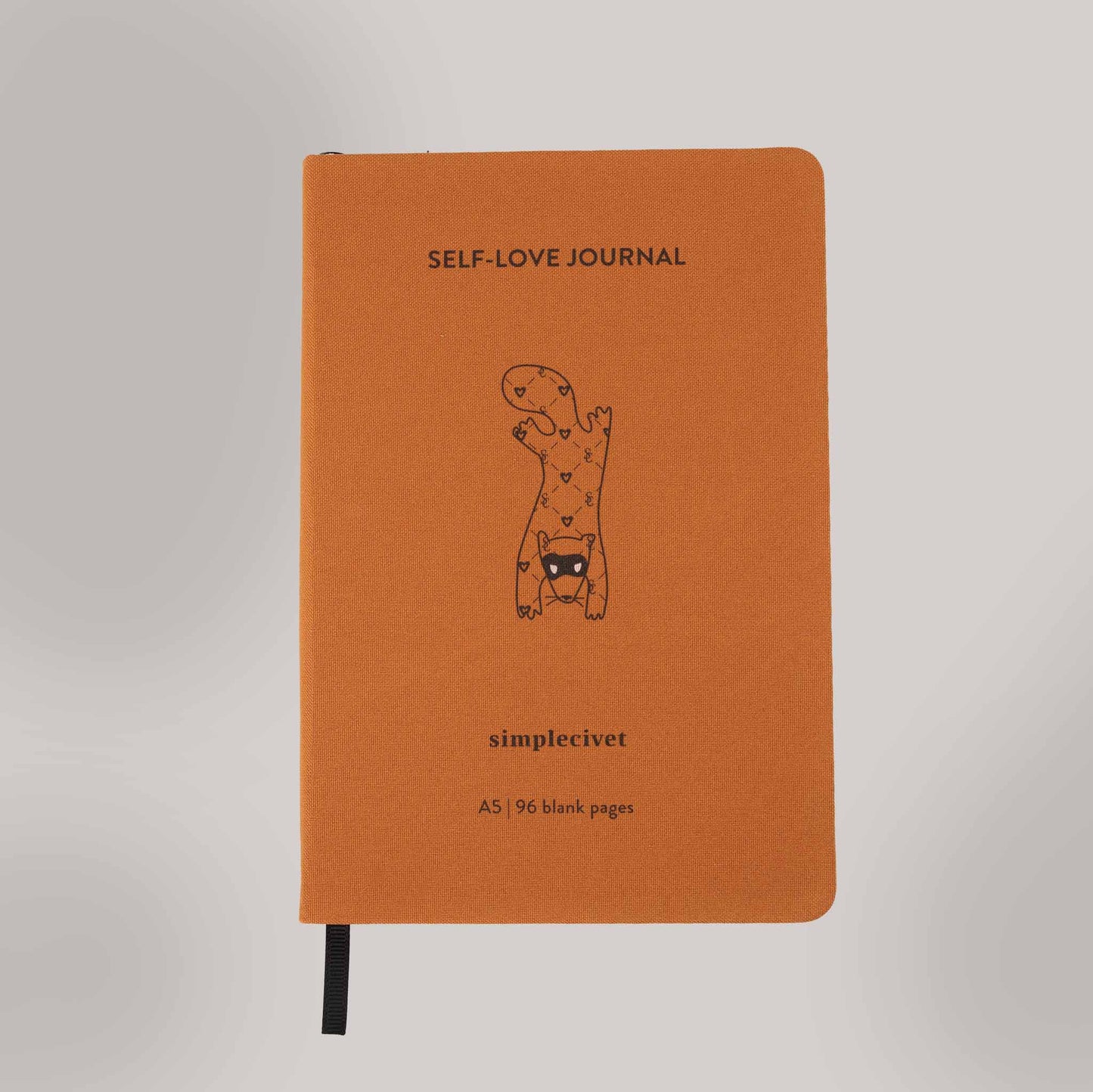 self-love journal with black ribbon