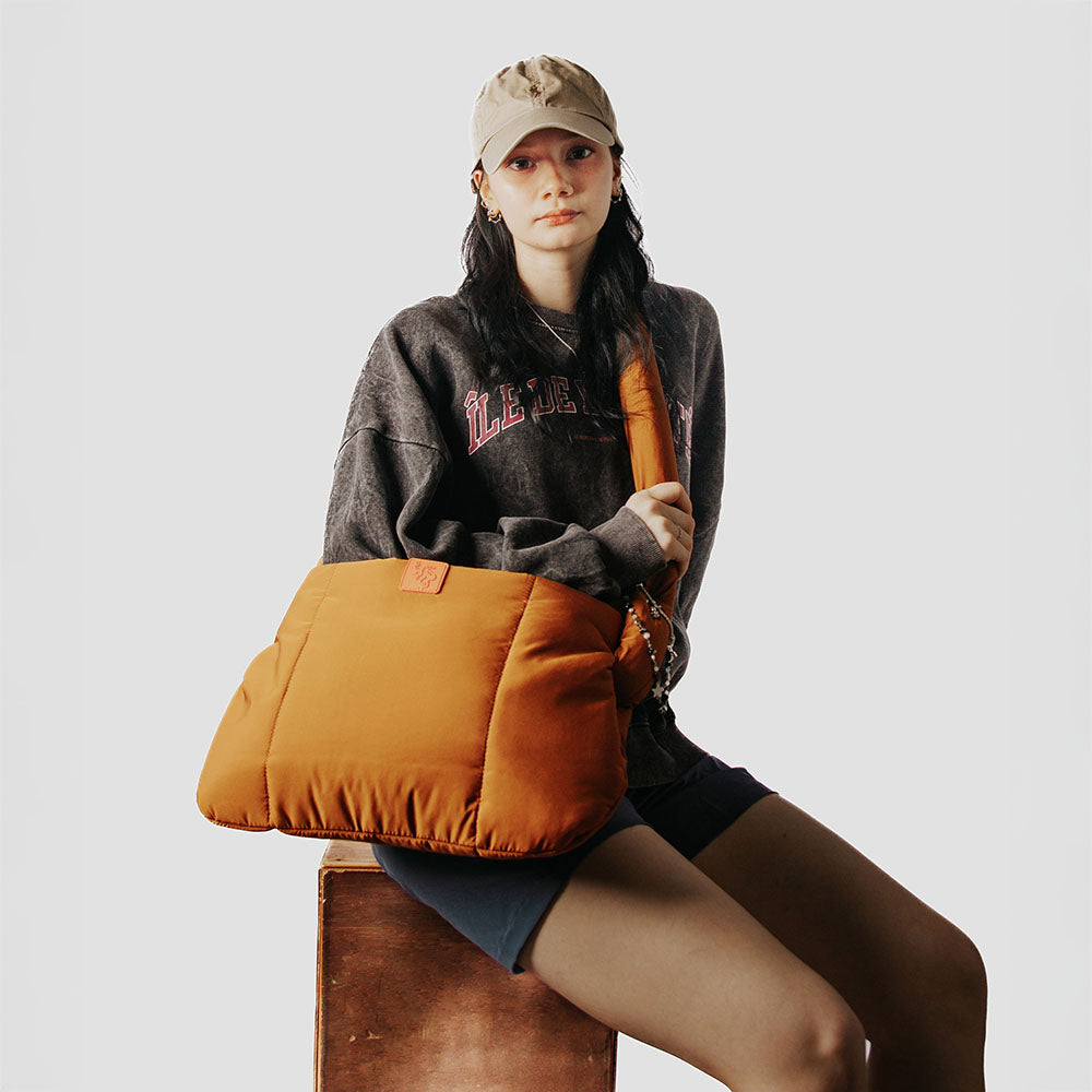 puffer-protect tote bag with adjustable two-way sling