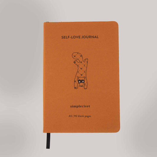 self-love journal with black ribbon